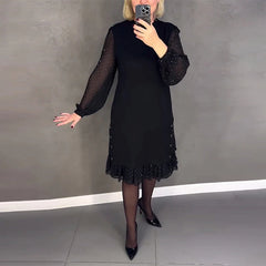 Langarmige elegante jurk met stippen in de kleur Zwart voor dames in stijl ideaal voor de herfst.