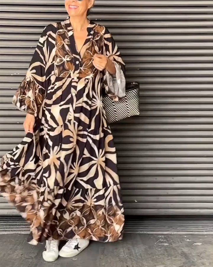 Loose fit bedrukte vakantiejurk in de kleur Zwart voor dames in stijl ideaal voor de lente.