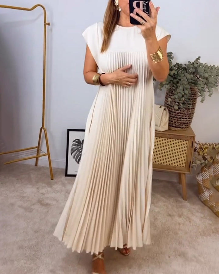 Mouwloze geplooide eenvoudige effen kleur jurk in de kleur Beige voor dames in stijl ideaal voor de herfst.