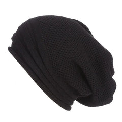 Nina | Comfy & trendy gebreide beanie in de kleur Zwart voor dames in Streetwear stijl ideaal voor de winter