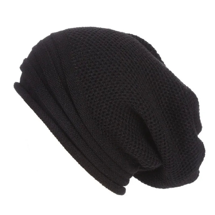 Nina | Comfy & trendy gebreide beanie in de kleur Zwart voor dames in Streetwear stijl ideaal voor de winter